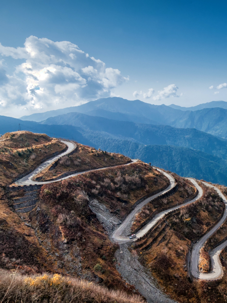 Mountainside winding road. Our journey (figurative).